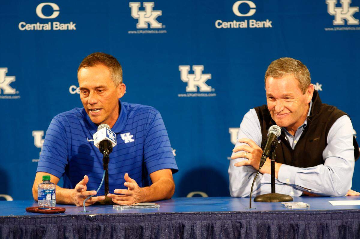 Kentucky Athletics Director Mitch Barnhart, right, described the search that landed Troy Fabiano, left, this way: “We visited with a lot of folks. There’s one person that kept rising to the top of every conversation and of everything that we looked at.”