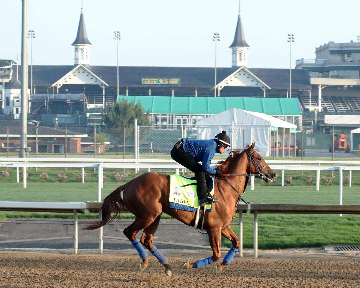 Taiba, one of two Kentucky Derby contenders trained by Tim Yakteen, gallops at Churchill Downs on May 2, 2022.