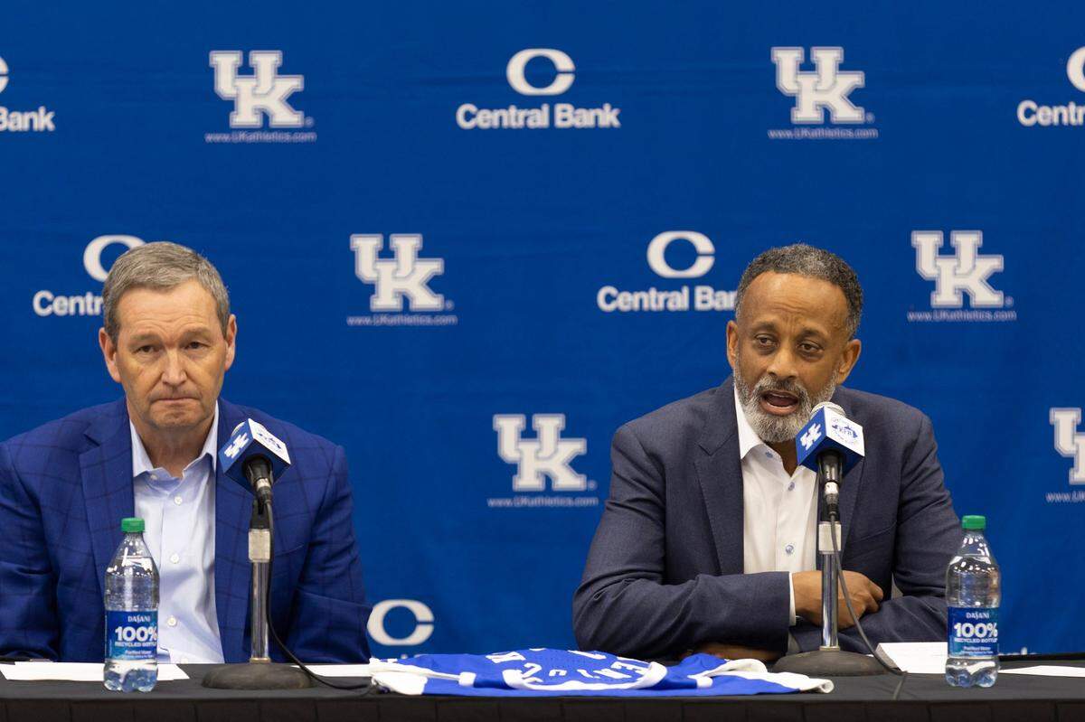 Kenny Brooks, right, alongside UK athletics director Mitch Barnhart, speaks during his introductory press conference as the head coach of Kentucky women’s basketball on March 28. Brooks comes from Virginia Tech, where he led his team to the Final Four in 2023.