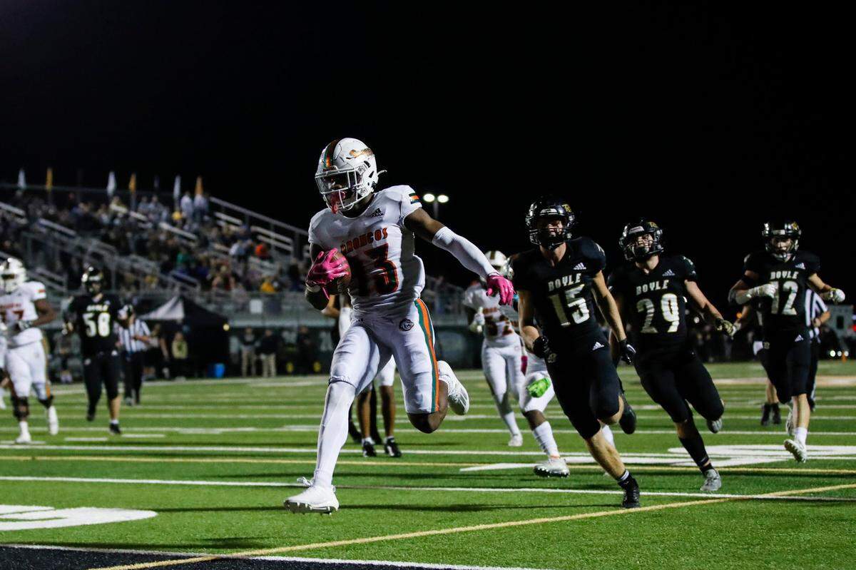 Frederick Douglass’s Ty Bryant (13) scores a touchdown against Boyle County on Friday night in Danville.
