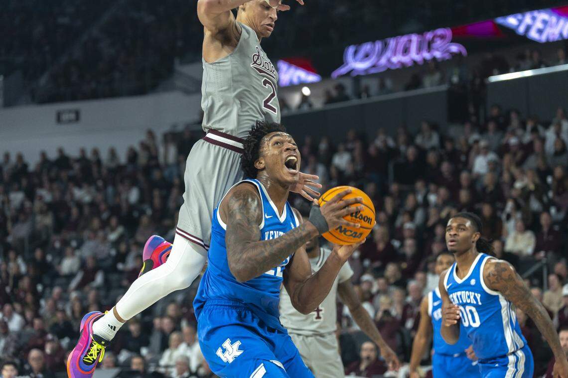 Kentucky center Amari Williams (22) looks to shoot as Mississippi State’s Riley Kugel (2) defends during Saturday’s game at Humphrey Coliseum in Starkville, Miss. Williams finished with 10 points, 12 rebounds, six assists and two blocked shots.