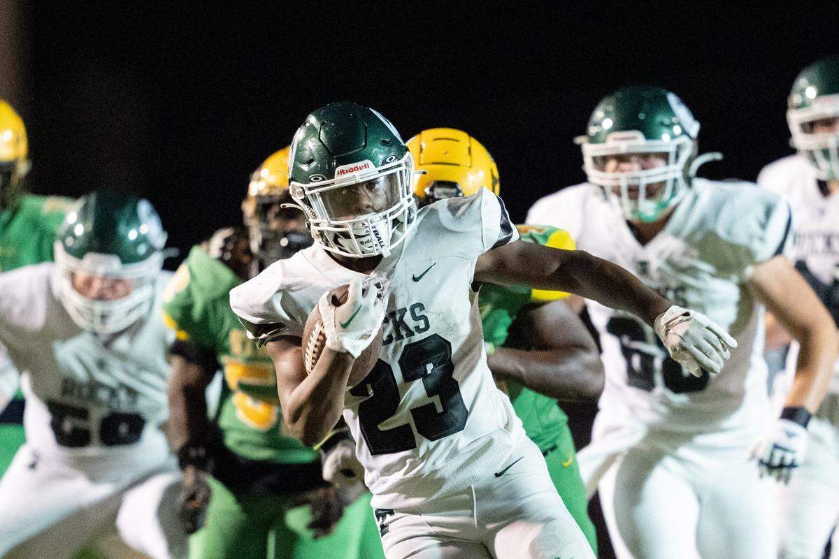 Trinity's Jamaurion Berry (23) makes a break to the end zone during their game against Bryan Station on Friday, Aug. 23, 2024 at Bryan Station High School in Lexington, Ky.