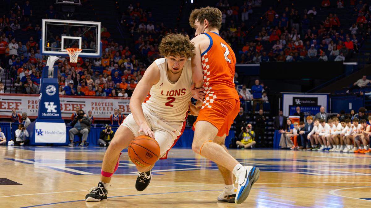 Boyd County's Jacob Spurlock pushing past Marshall County's Ryan Stokes during the UK HealthCare Boys' Basketball Sweet 16 state tournament first-round game between the Marshall County Marshals and the Boyd County Bears at Rupp Arena in Lexington, Ky, on March 19, 2026.