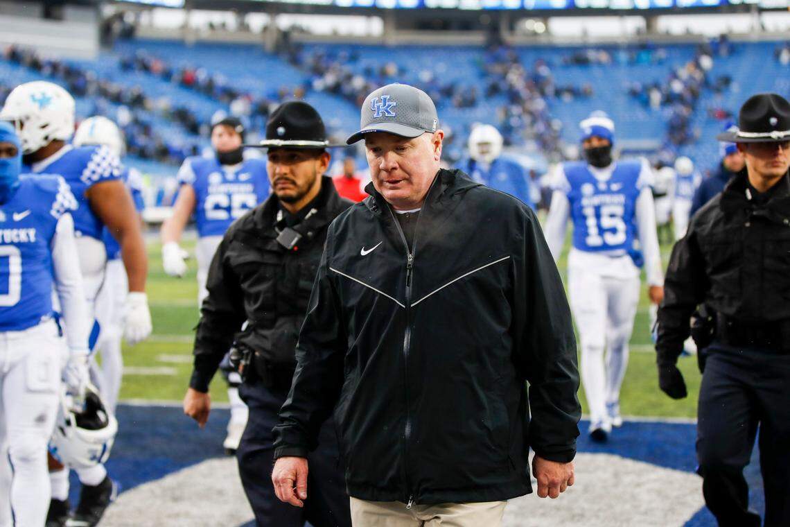 Kentucky head coach Mark Stoops walks off the field after his team lost 24-21 to Vanderbilt on Saturday at Kroger Field.
