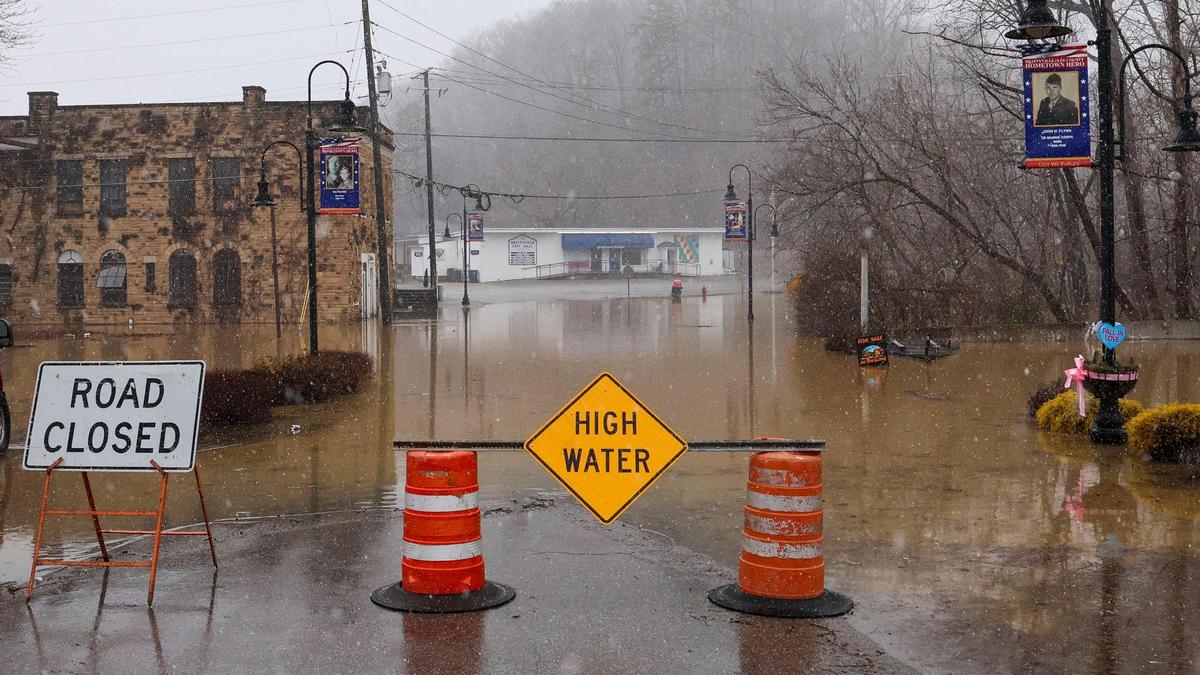 Part of Main Street is closed because of high flood waters after severe overnight rain hit Beattyville, Ky. Sunday, Feb. 14, 2025.