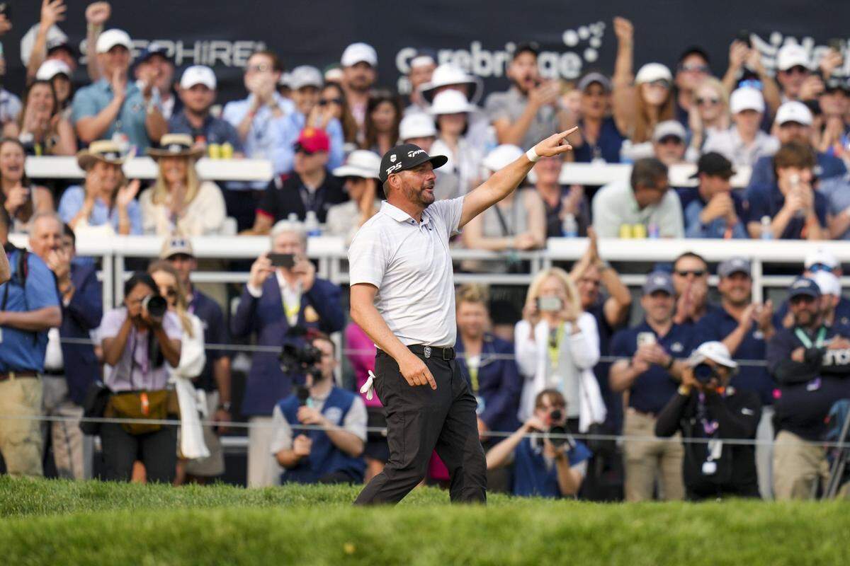 Michael Block acknowledges the fans on the 18th green during the final round of the PGA Championship in New York on Sunday. The club pro from California finished in 15th place, earning a guaranteed spot in next year’s PGA Championship in Louisville.