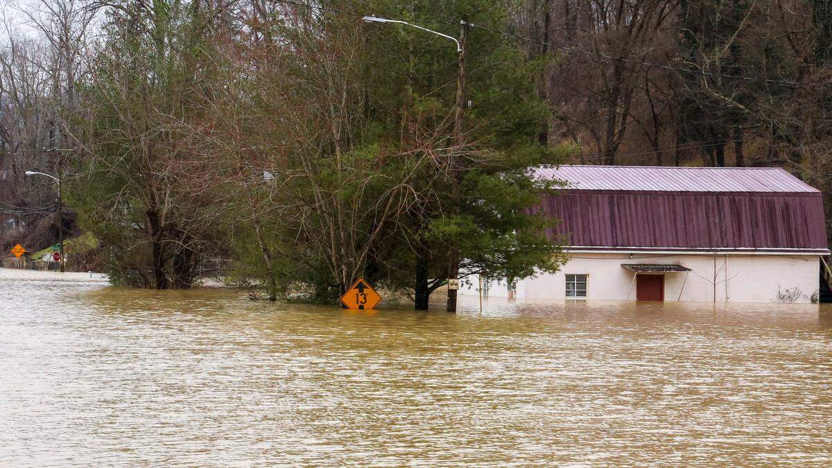 Flood waters and buildings along W Main Street, Sunday, Feb. 14, 2025, in Beattyville, Ky. after severe overnight rain hit the Eastern Kentucky town, leaving many parts of the town flooded.