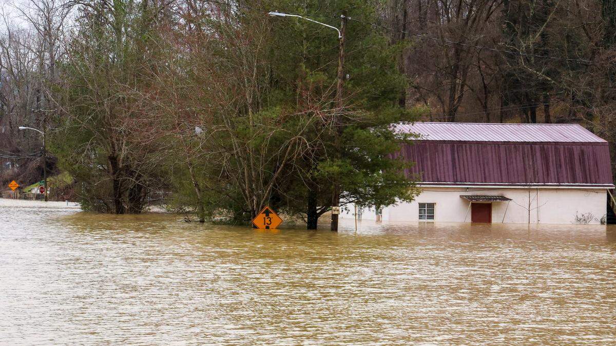 Flood waters and buildings along W Main Street, Sunday, Feb. 14, 2025, in Beattyville, Ky. after severe overnight rain hit the Eastern Kentucky town, leaving many parts of the town flooded.