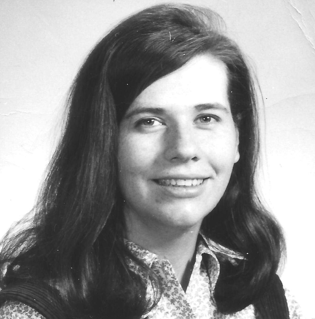 Pat Holland as she looked in 1969. This photo is from her National Geographic ID badge. She and her husband, Rob, drove up to New York from their home in Washington, D.C. After 26 years at the magazine, Holland retired. She lives now in Woodford County and plays often at Broomwagon Coffee Shop’s Monday night jams.