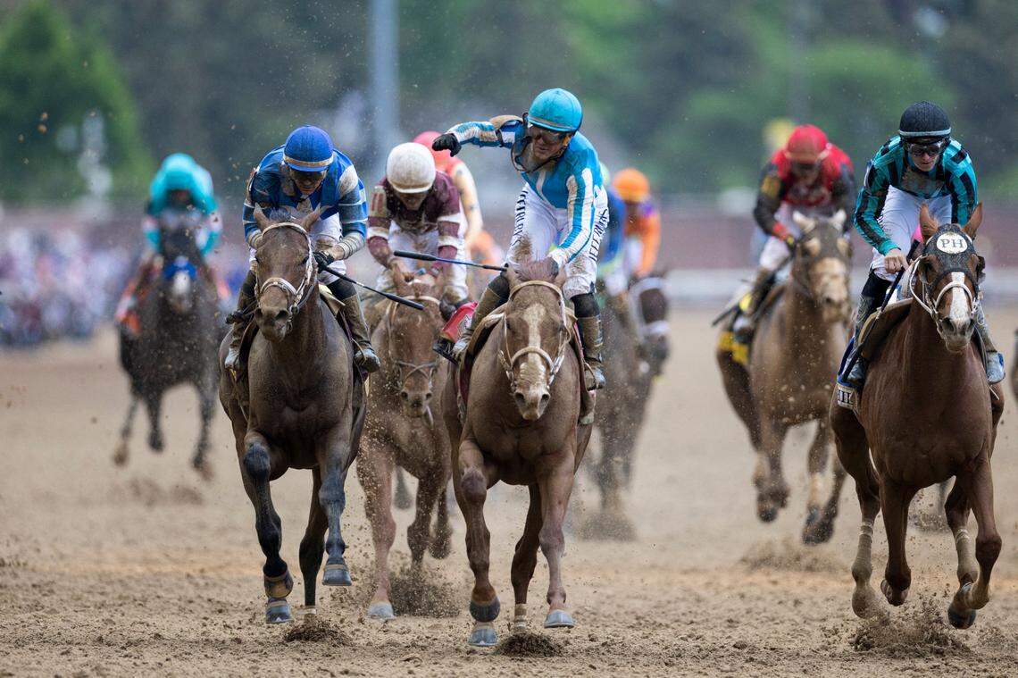 Mage, with Javier Castellano up, crosses the finish to win the 149th running of the Kentucky Derby at Churchill Downs.