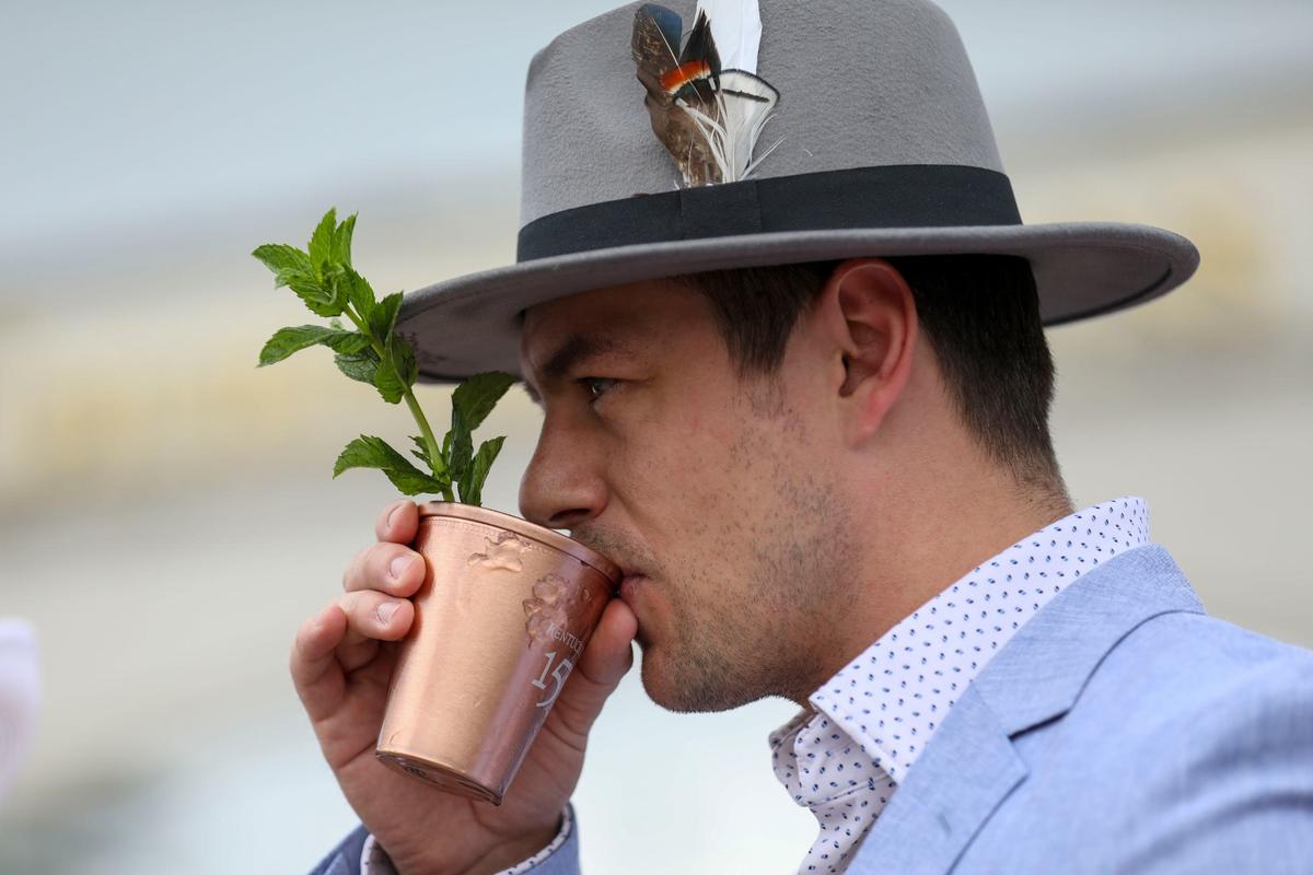 Kevin Barrett with a handmade hat with hand stitching at Churchill Downs in Louisville, Ky., Saturday, May 4, 2024.
