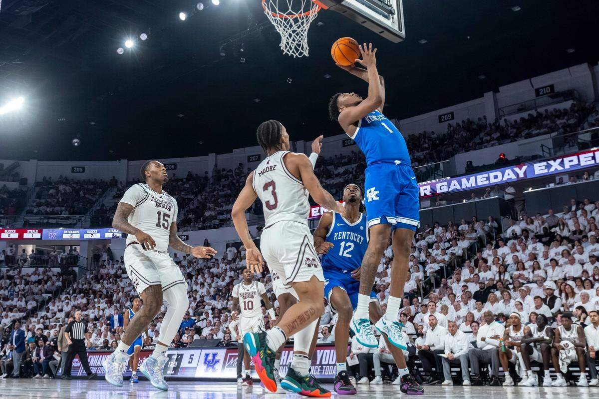 Kentucky’s Justin Edwards (1) shoots over Mississippi State’s Shakeel Moore (3) in Starkville, Miss., on Tuesday night. Edwards finished with two points and four rebounds.