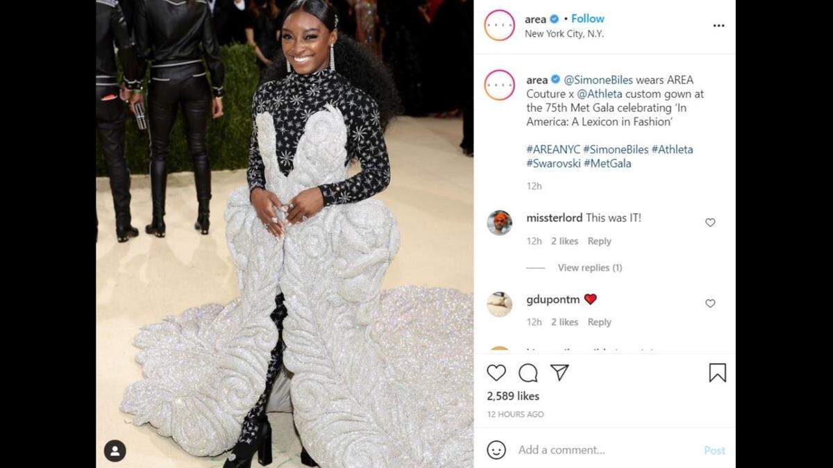 Olympic gymnast Simone Biles wears a dress designed by Lexington native Beckett Fogg to the 2021 Met Gala on Monday, Sept. 13, 2021. The dress weighed 88 pounds, Biles told reporters at the Met Gala.