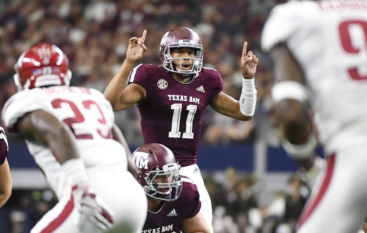 Texas A&M quarterback Kellen Mond (11) is one of only four power-five conference quarterbacks with at least four rushing touchdowns and seven passing touchdowns in the 2018 season.