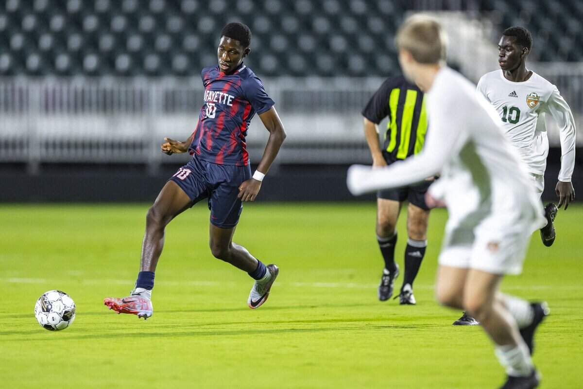 Lafayette's Justice Oladeji (10) moves the ball during a game against Frederick Douglass at Lexington Sporting Club stadium in Lexington, Ky., on Thursday, Sept. 25, 2025.