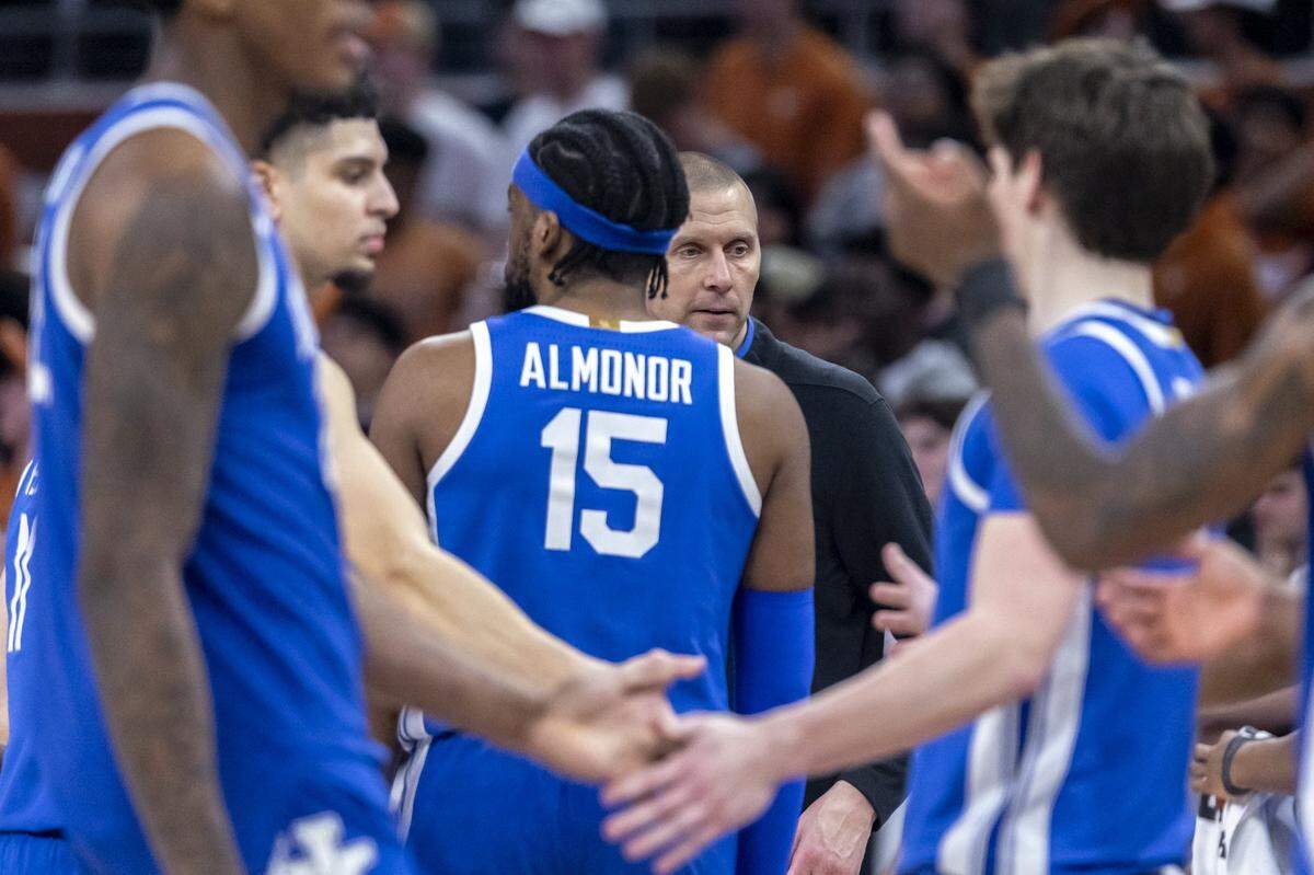 Kentucky head coach Mark Pope gets ready to talk to his team during a timeout in an 82-78 loss to Texas on Saturday night.