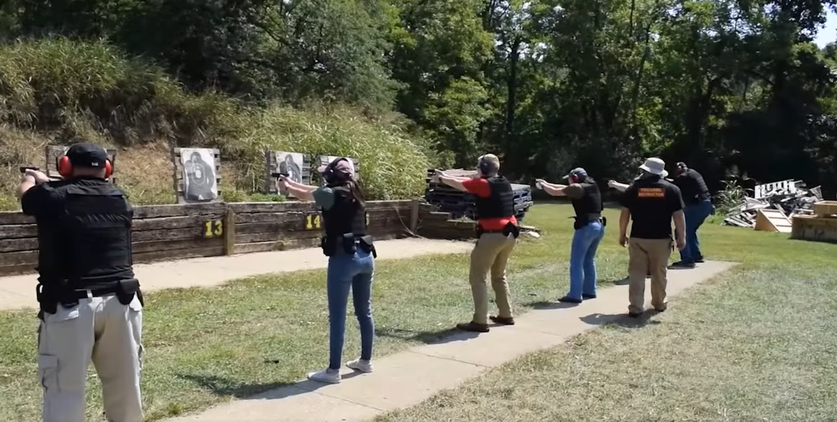 Kentucky probation and parole officers practice their shooting in 2022. The officers are sworn law enforcement agents who carry badges and guns and have arrest authority over offenders on their caseloads.