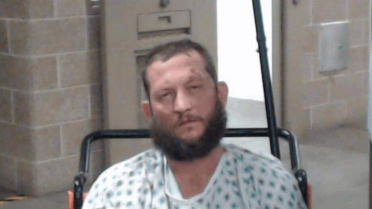 Nathaniel Harper was taken to jail after he was treated at the University of Kentucky Hospital in Lexington. Harper allegedly was the driver of a stolen truck that crashed, resulting in the death of a Lexington homeless man, according to police.