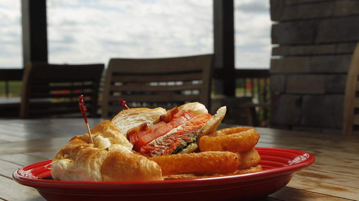 The salmon for the club sandwich is smoked on the premises.