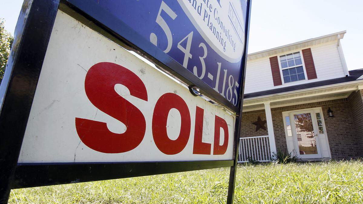 A sold sign in front of a house in the Masterson Station Subdivision off Leestown Rd. in Lexington, Ky., Wednesday, September 19, 2012. Photo by Charles Bertram | Staff
