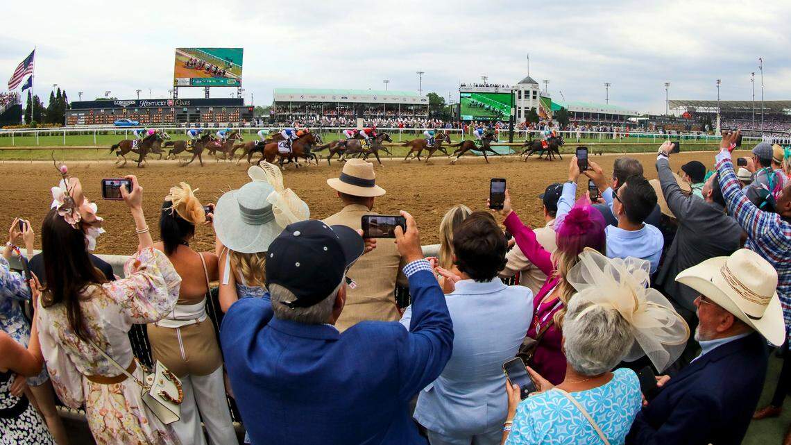 The field makes their way the first time around past the winner’s circle during the 149th running of the Kentucky Derby at Churchill Downs in Louisville, Ky., on Saturday, May 6, 2023. Mage won the Run for the Roses.