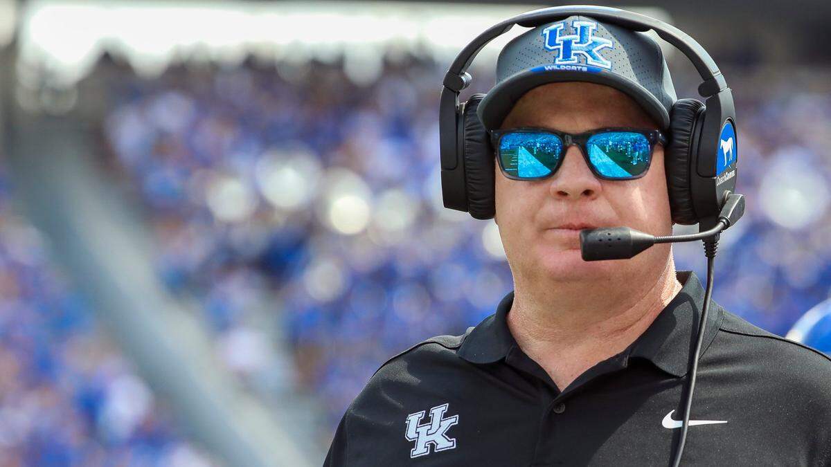 In an expanded SEC that now includes former Big 12 powers Oklahoma and Texas, the path to “success” for coaches such as Kentucky’s Mark Stoops looks even more daunting than before.