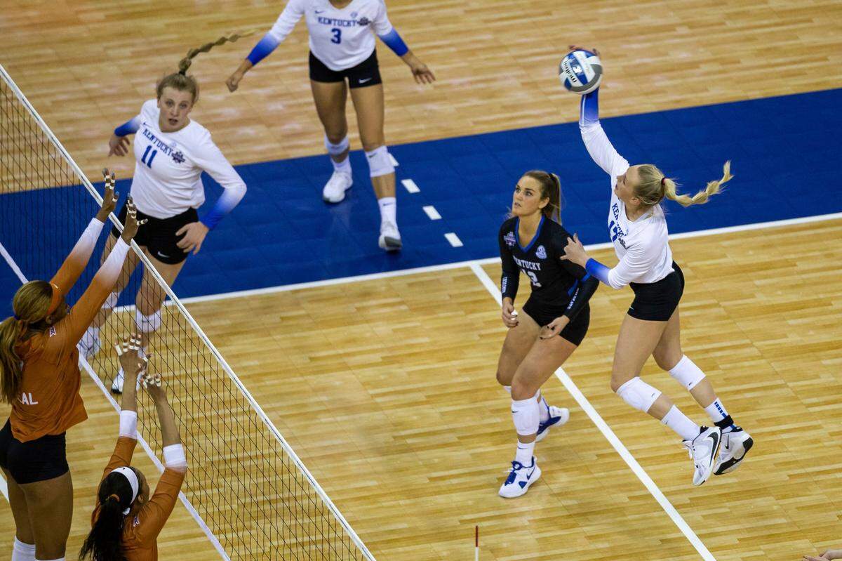 Kentucky’s Alli Stumler (17) gets a kill against Texas’ Skylar Fields (5) during the second set of UK’s victory over the Longhorns in the NCAA Tournament championship Game of last year’s spring season.