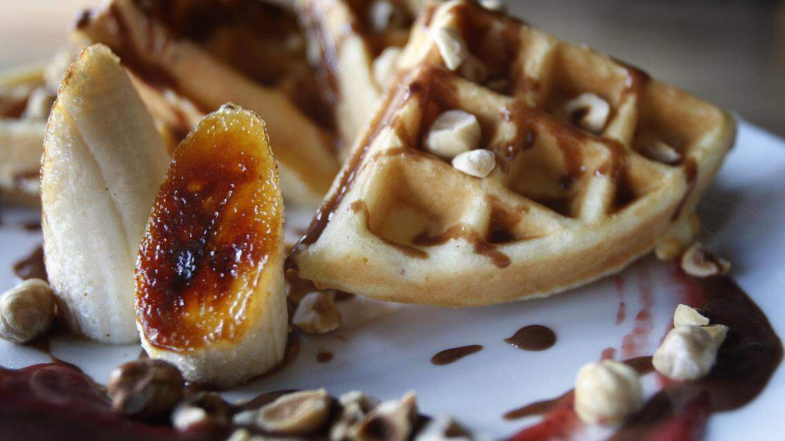 The waffle is made with champagne and rose water with a bruléed banana and Nutella. 