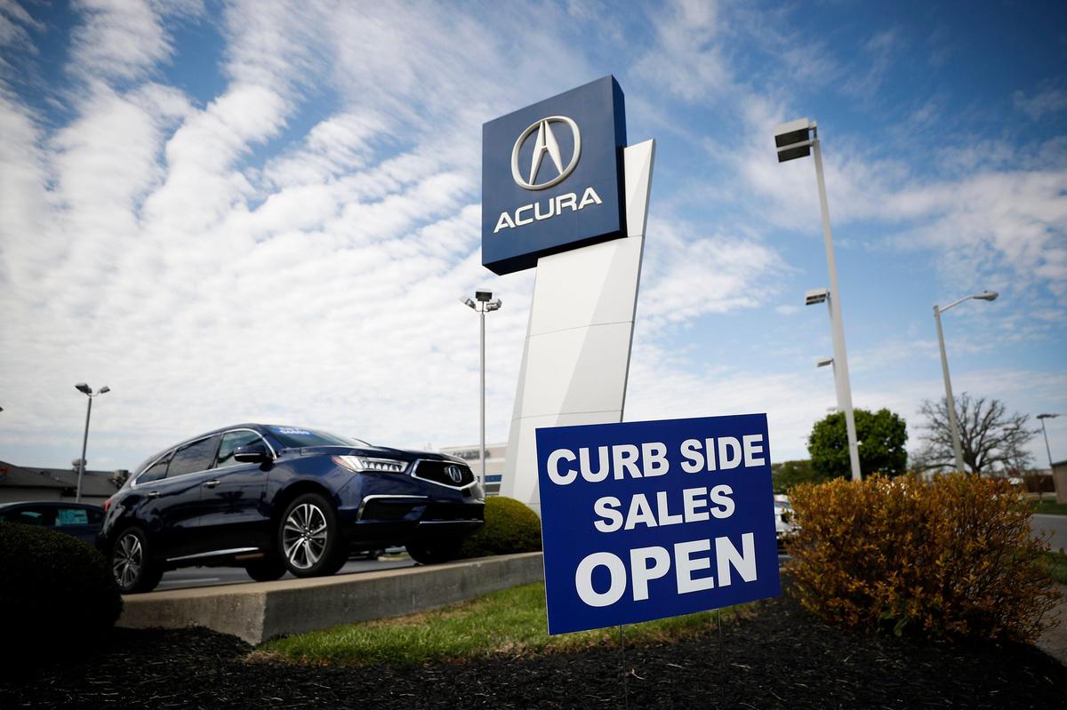 Due to current restrictions, customers are not permitted inside of Courtesy Acura off Nicholasville Road and all sales were being done curbside.
