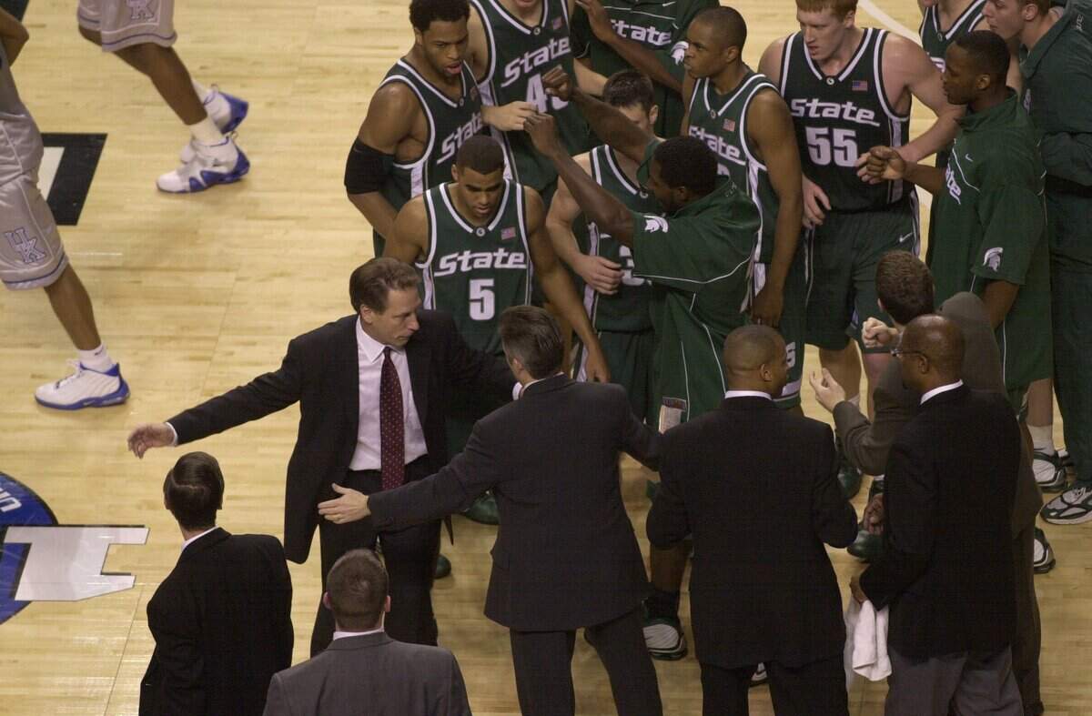 Michigan State’s coach Tom Izzo reacts after the Spartans took a late lead en route to defeating Kentucky 71-67 in Rupp Arena on Dec. 14, 2002.