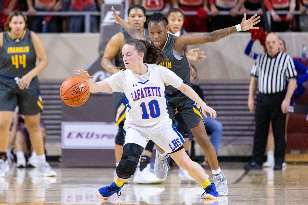 Franklin County’s Nevaeh Carter guards Lafayette’s Catherine Jacobs during the 11th Region Tournament finals. The Flyers bring a 27-7 record into the Sweet 16.
