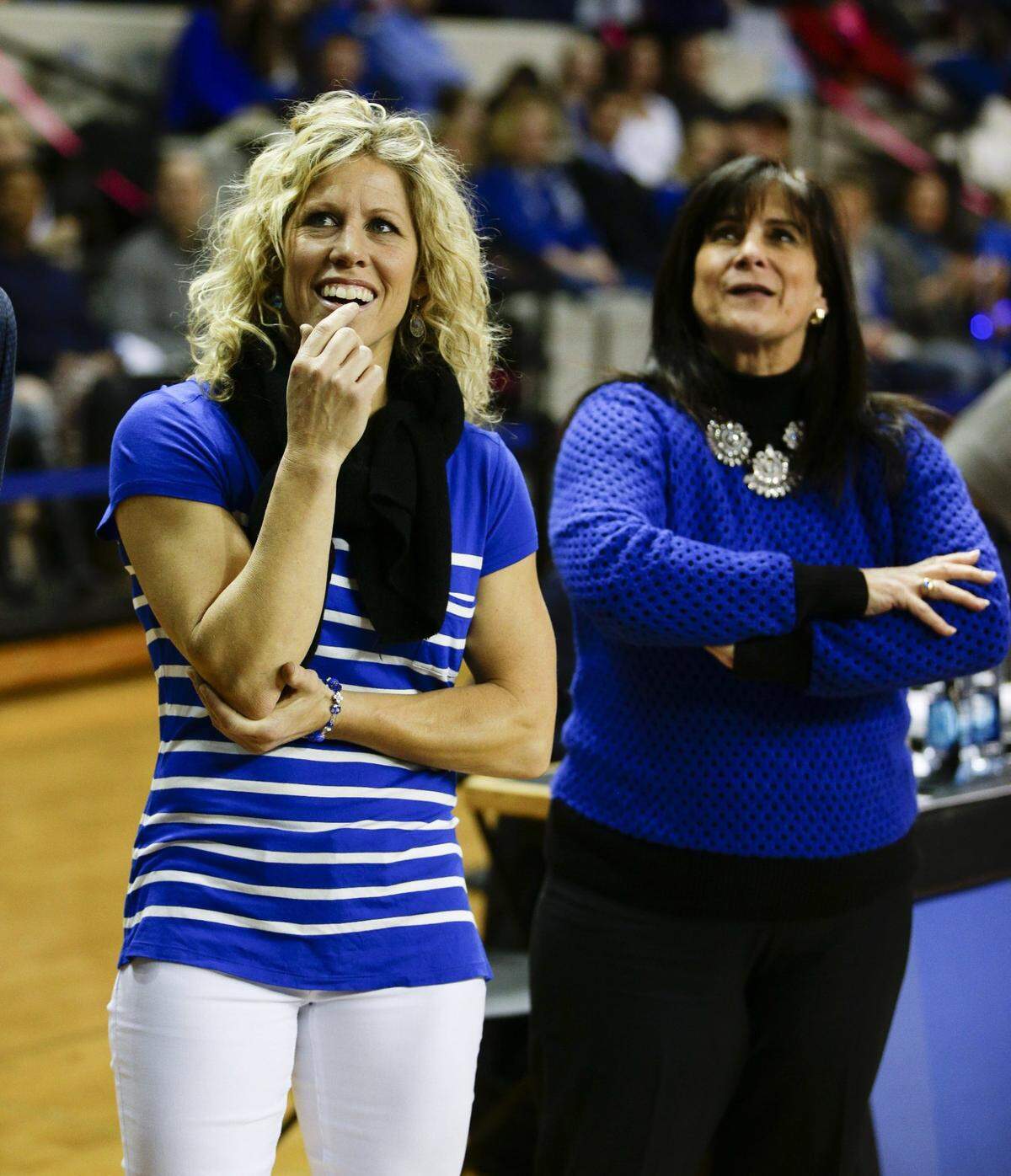 Former UK gymnastic great Jenny Hansen, foreground, became the second female athlete in Kentucky Wildcats history to have a jersey retired in her honor on February 20, 2015.