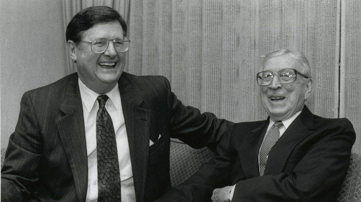 Former University of Kentucky basketball coach Joe B. Hall, left, laughs with former UCLA coach John Wooden during a news conference in Lexington on Nov. 15, 1991. The two were central figures in the most memorable UK-UCLA clash of all time.
