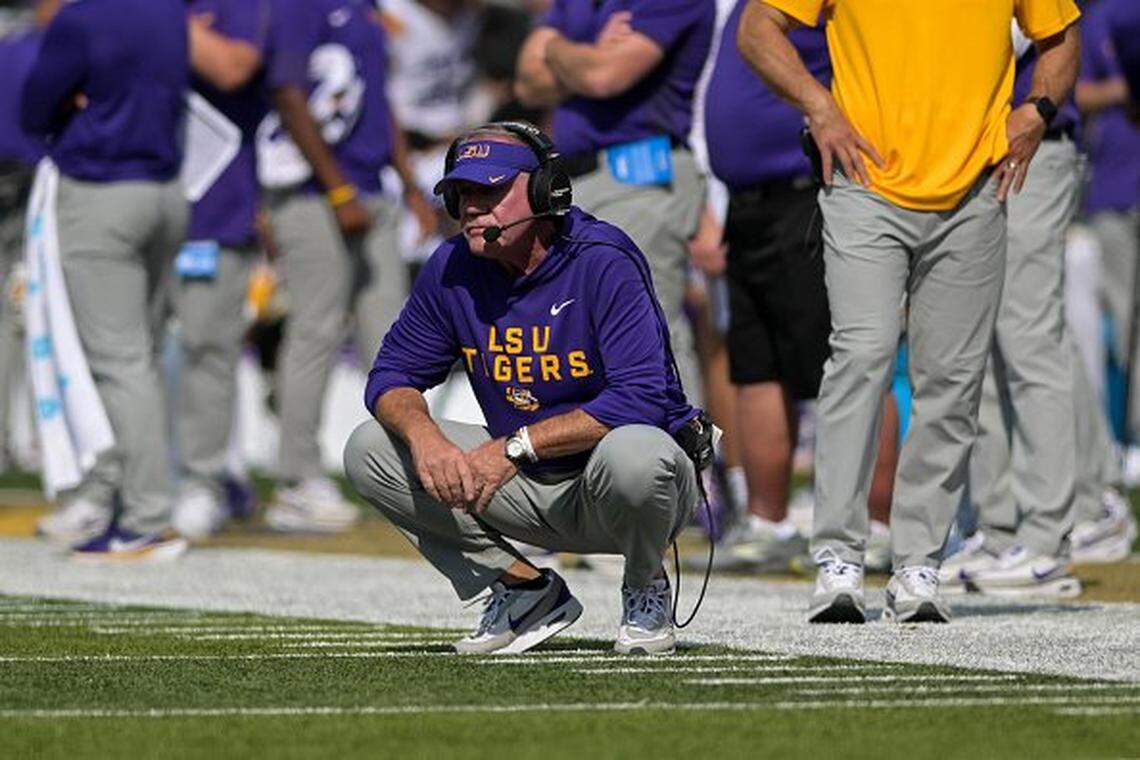 NASHVILLE, TENNESSEE - OCTOBER 18: Head Coach Brian Kelly of the LSU Tigers squats on the sideline in the second half against the Vanderbilt Commodores at FirstBank Stadium on October 18, 2025 in Nashville, Tennessee. (Photo by Carly Mackler/Getty Images)