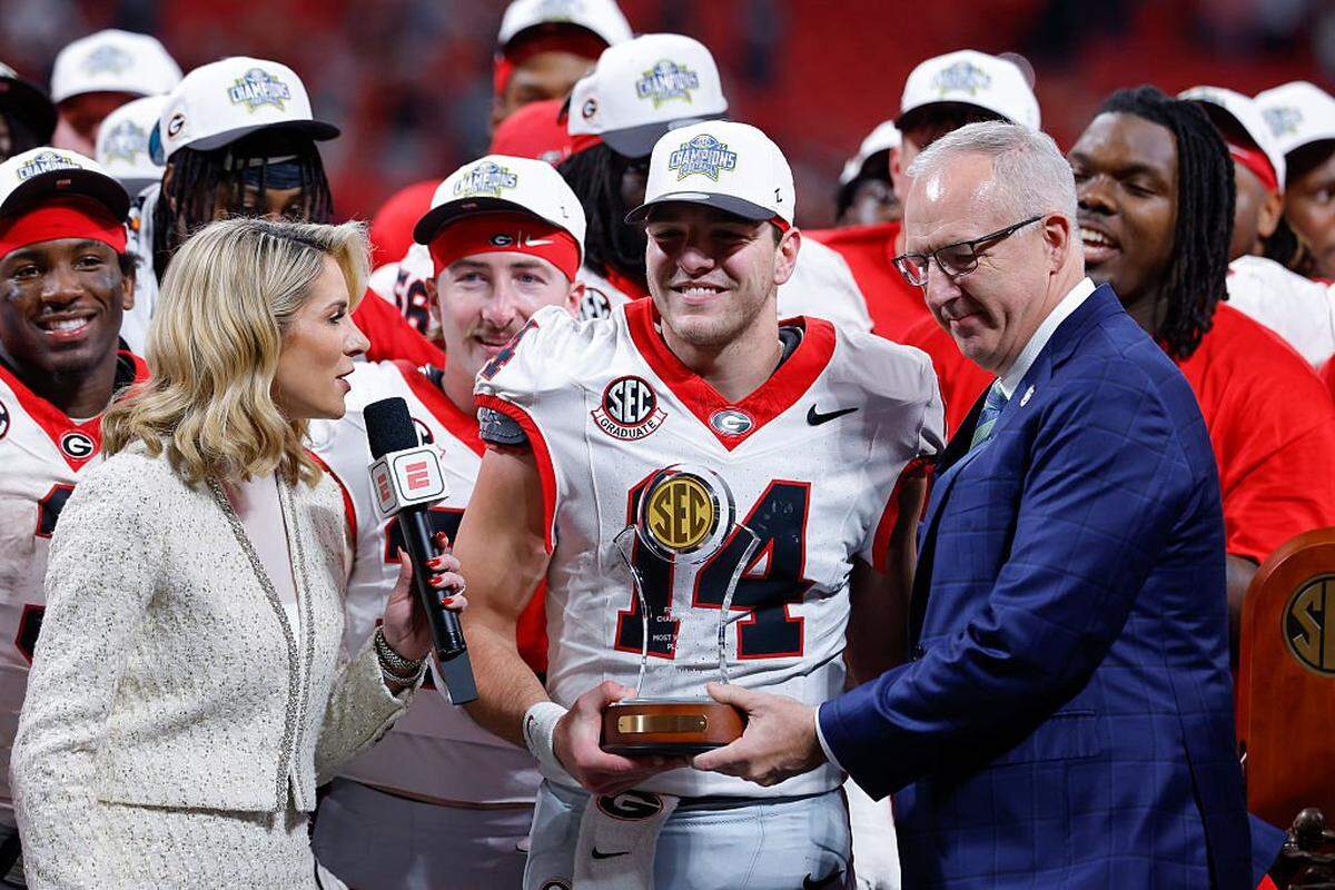 SEC commissioner Greg Sankey (right) and Southeastern Conference schools have ample reason to be wary of the new U.S. Senate bill that aspires to “fix” college sports.