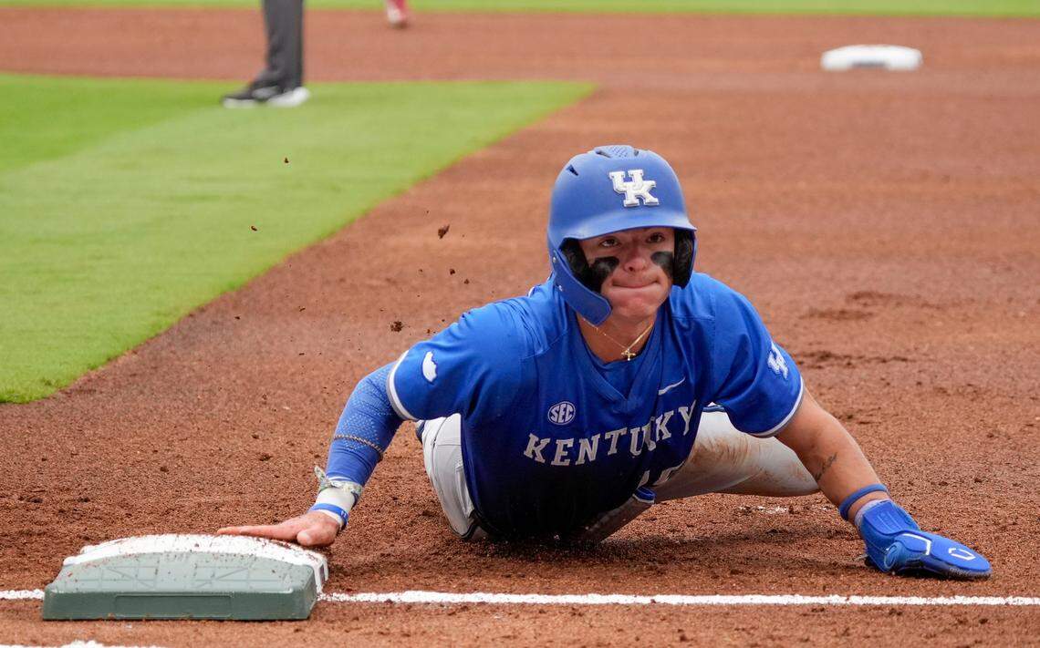 May 20, 2025; Hoover, AL, USA; Kentucky second baseman Luke Lawrence (10) dives back to first on a pickoff attempt during the game with Oklahoma in the first round of the SEC Baseball Tournament at the Hoover Met.