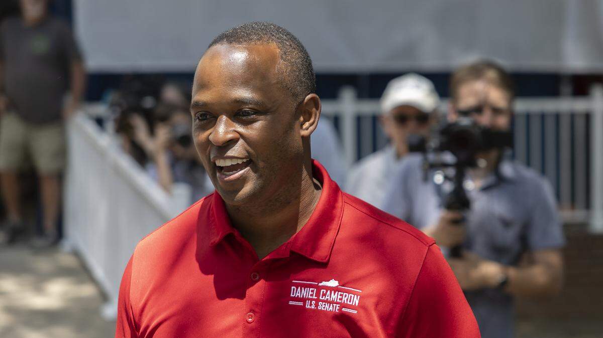 Daniel Cameron, former Kentucky Attorney General and U.S. Senate candidate, talks to supporters before the political speaking at the 145th Annual St. Jerome Fancy Farm Picnic in Fancy Farm, Ky., on Saturday, Aug. 2, 2025.