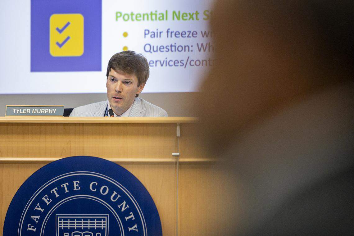 Tyler Murphy, the board chair, speaks during a school board meeting on Monday, Aug. 18, 2025, at Fayette County Public Schools Central Office in Lexington, Ky.