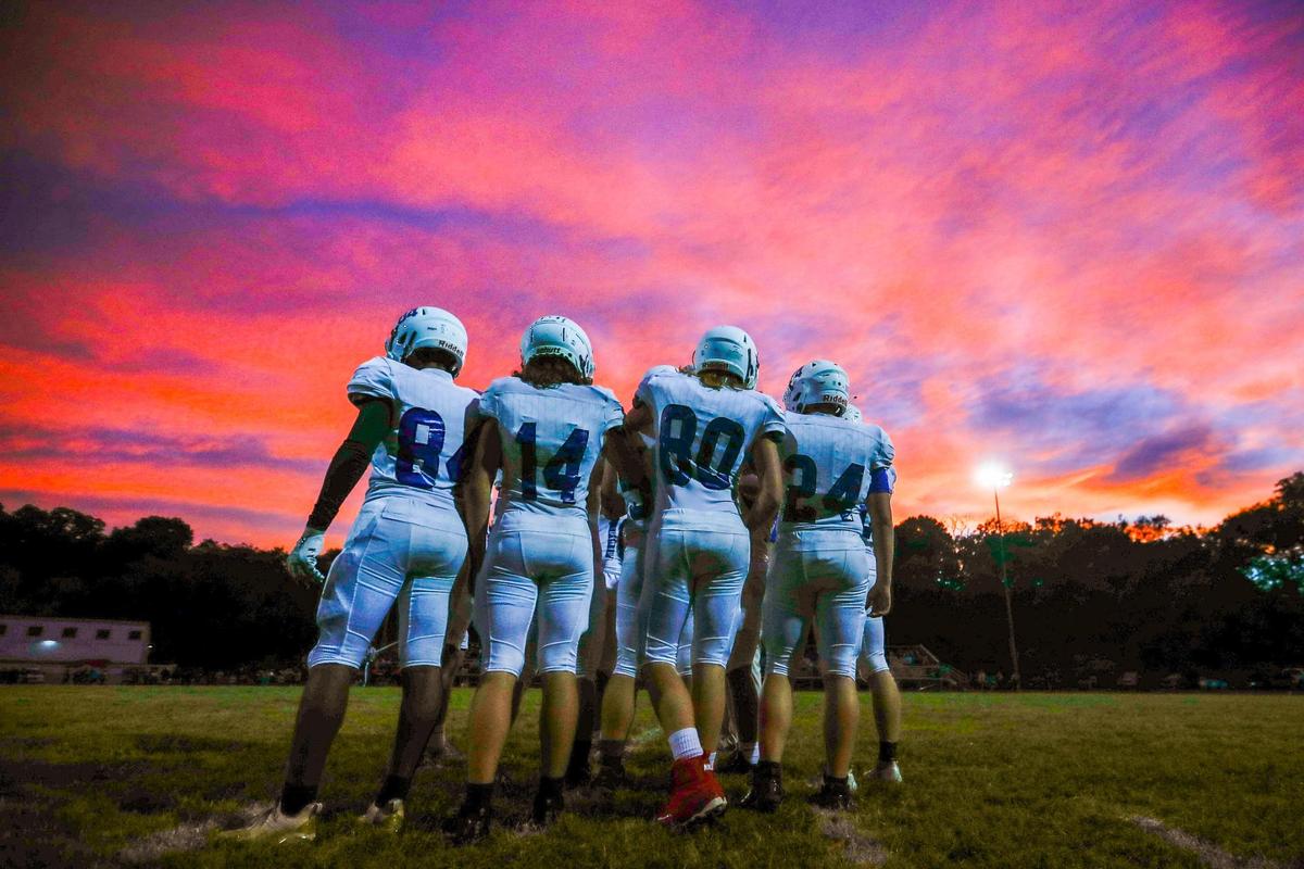 Members of the Bracken County Polar Bears stand on the field before kickoff against the Paris Greyhounds during a game at Paris High School in Paris, Ky., Friday, September 30, 2022.
