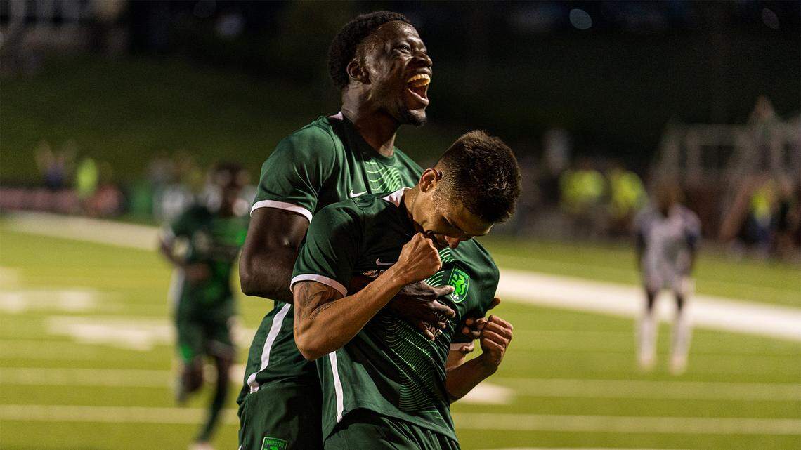 Lexington Sporting Club’s Khalid Balogun, left, and Owen Green celebrate Green’s late goal that proved to be the game-winner against South Georgia Tormenta FC on Saturday in Georgetown.