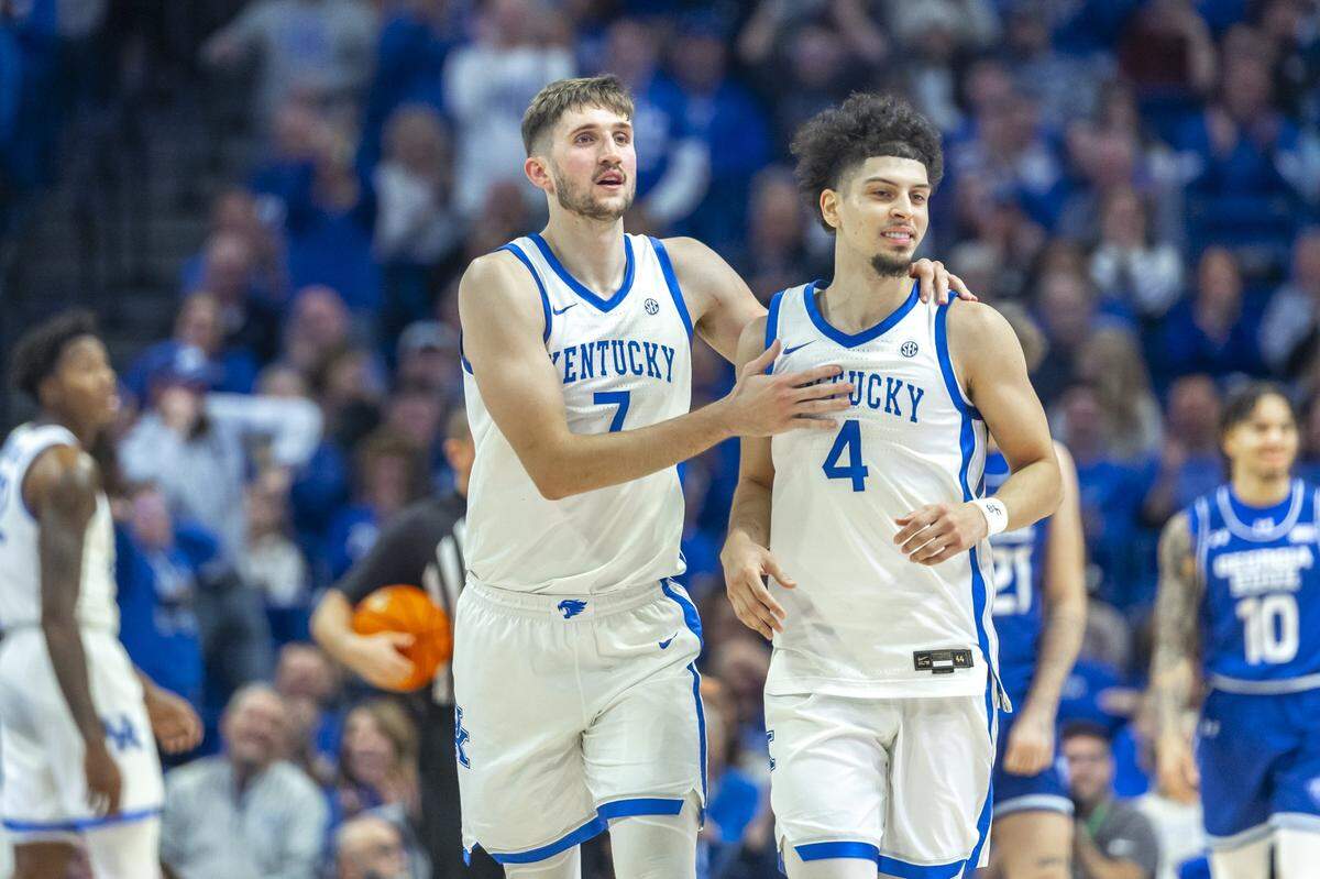 Kentucky forward Andrew Carr puts his arm around teammate Koby Brea during one of the Wildcats’ early games in November.