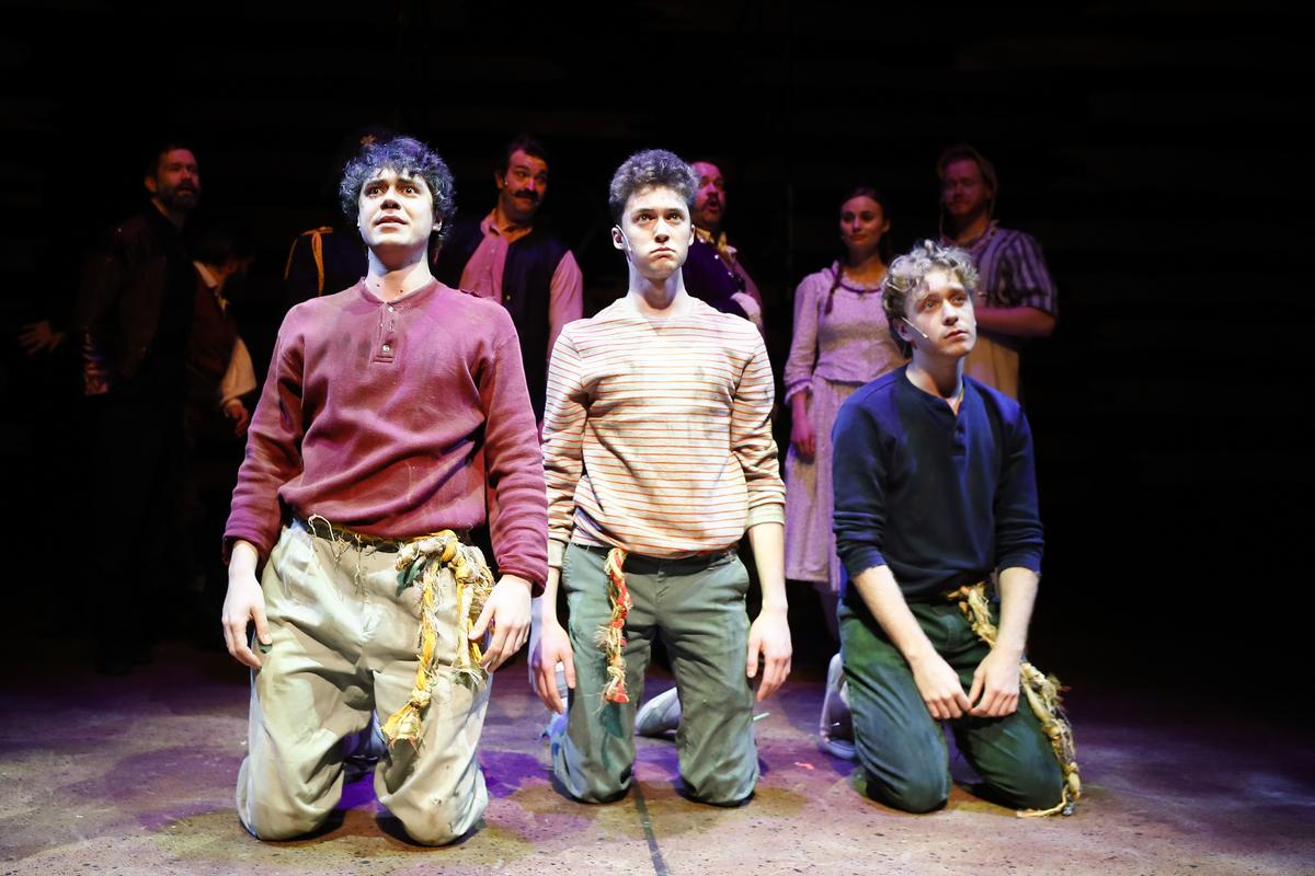 Jesse Hungerford from left, playing the role of Prentiss, Jordan Strouse, playing Peter, and Wylie Caudill, playing Teddy, act out a scene during rehearsal for “Peter and the Starcatcher” at the Woodford Theatre.