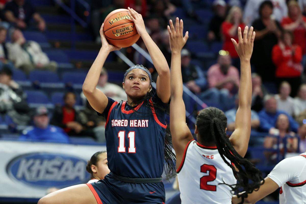 Sacred Heart junior ZaKiyah Johnson (11) narrowed her college list to 12 schools last November and says a decision could come before her senior season.