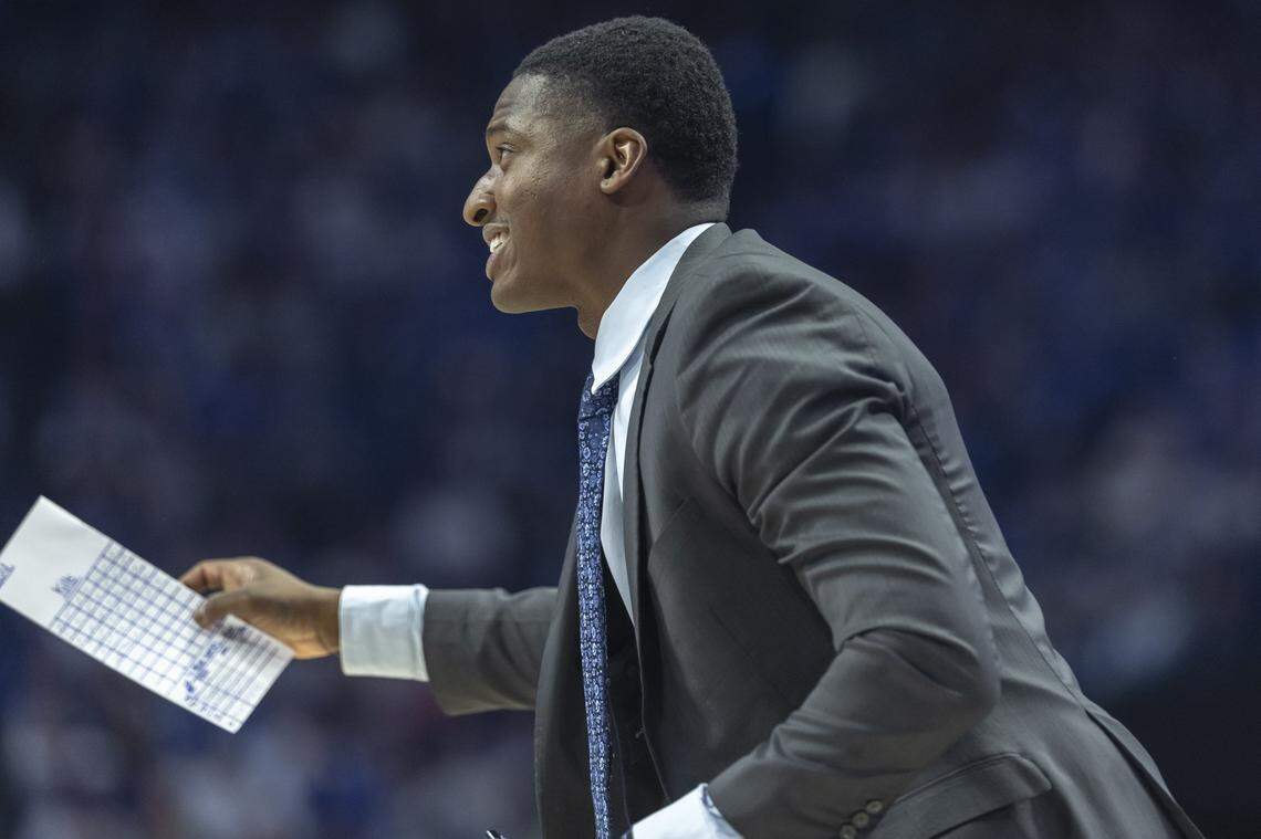 Kentucky assistant coach Mikhail McLean talks to the team’s players during Tuesday’s game against LSU at Rupp Arena.