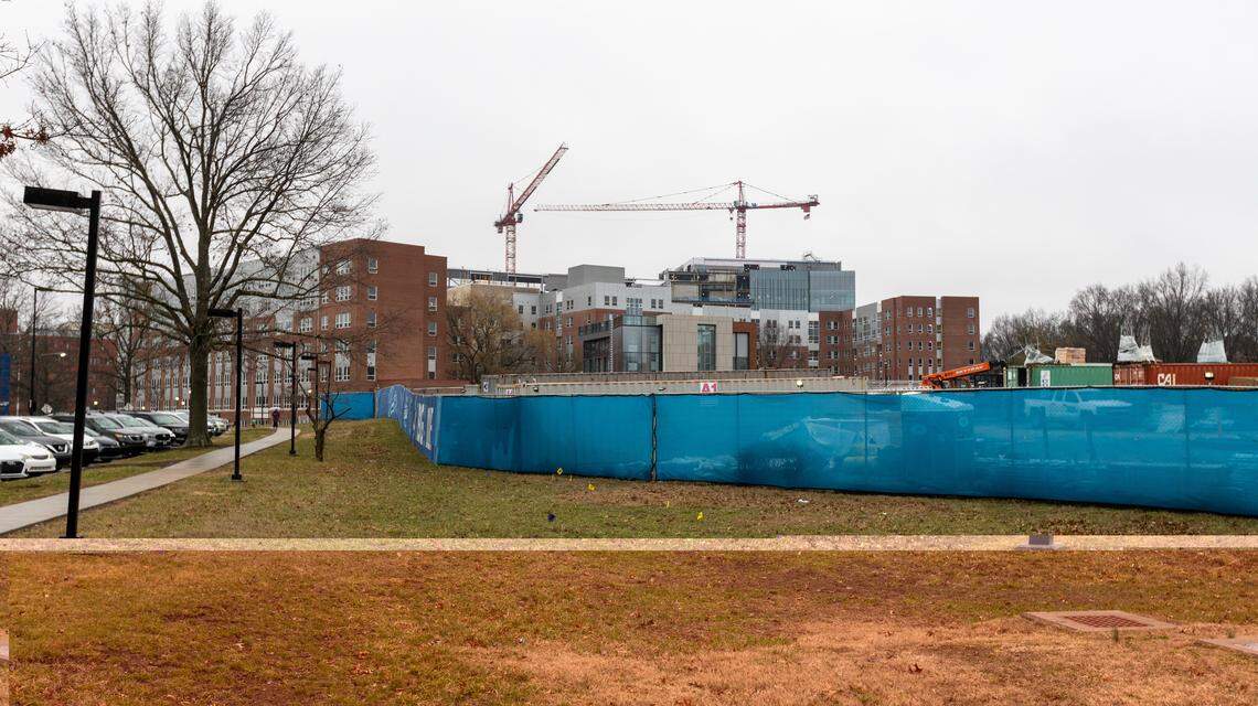 Blue fences on Complex Dr. marks area of new dormitory development at University of Kentucky’s south campus. March 2, 2026.