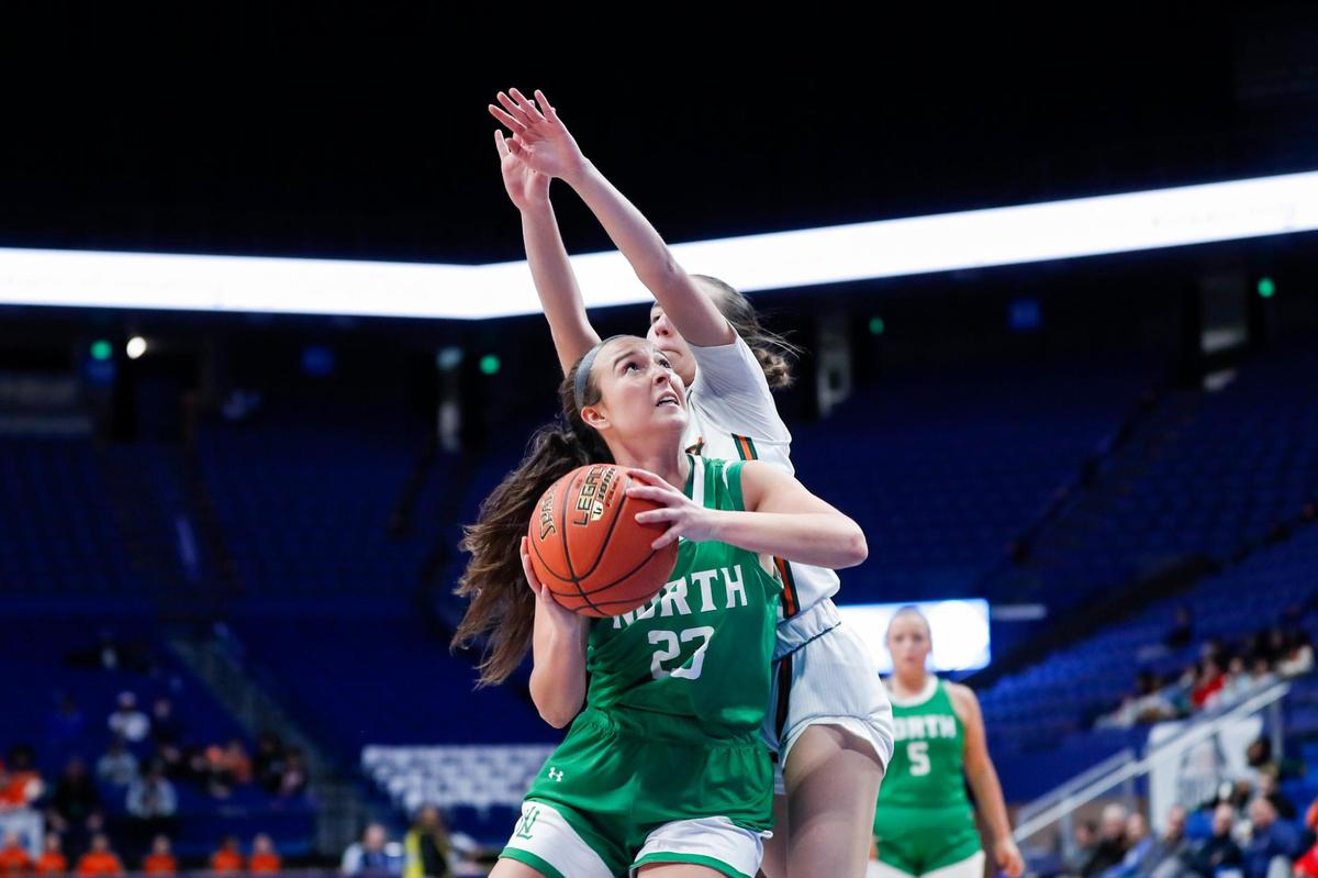 Emily Sizemore (23) scored 14 points, including the go-ahead basket in the closing seconds, as North Laurel knocked off Frederick Douglass.