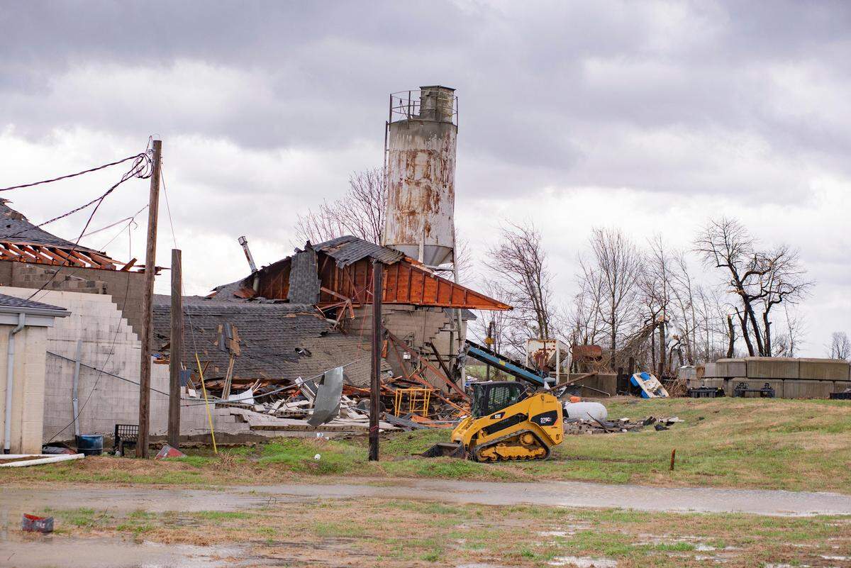 This Thursday, March 14, 2019 photo shows damage to the Wilbert Vault Co., in West Paducah, Ky.