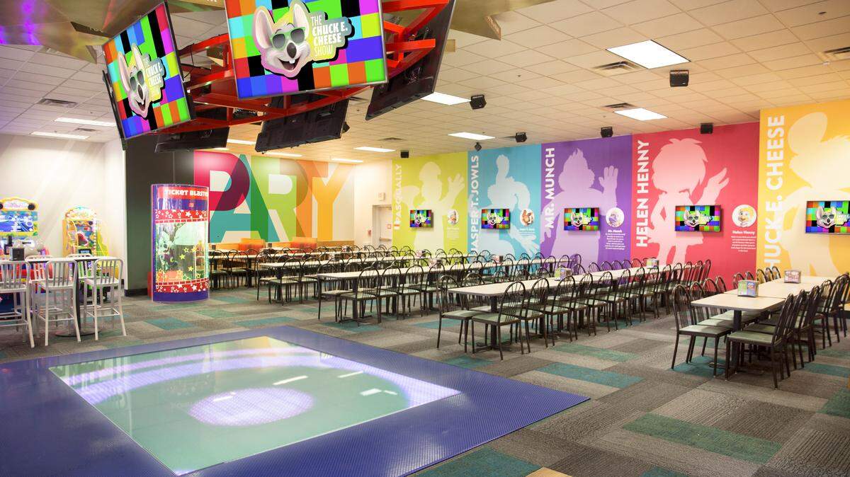 Chuck E. Cheese, including the Lexington location, has a new look inside and out. The restaurant now has an interactive dance floor, which lights up as kids move, where Chuck E. will dance.