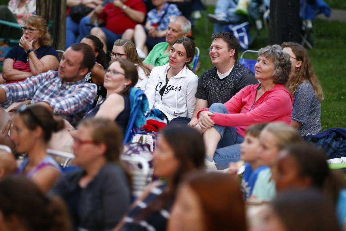 People watched during a performance of “Beauty and the Beast,” presented by the Kentucky Conservatory Theatre for Summerfest 2018 Friday at Woodland Park in Lexington. Performances being at 8:45 p.m. Thursday through Sunday until July 22. Tickets being at $11 for children at $16 for adults.
