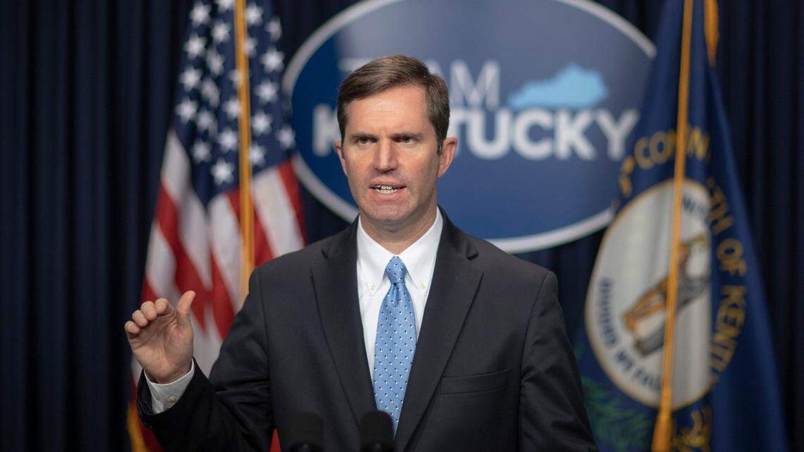 Kentucky Gov. Andy Beshear provides an update on the COVID-19 pandemic during a media conference at the state Capitol in Frankfort, Ky., on Thursday, Jan. 21, 2021.